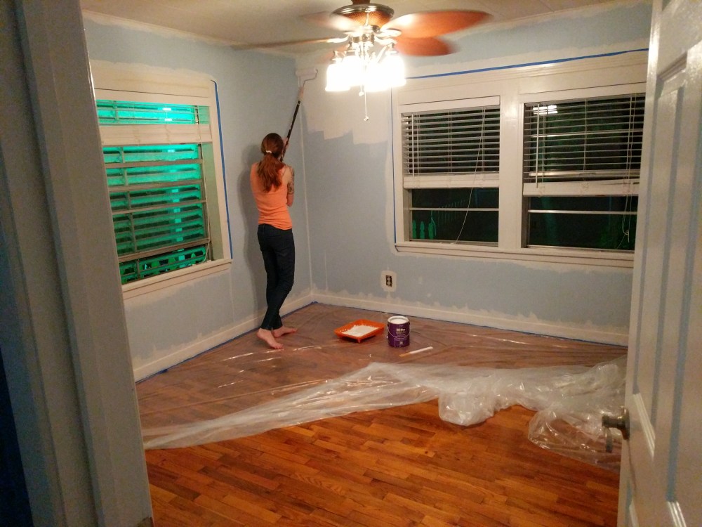 Applying primer to the walls